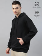 Man wearing a black hoodie