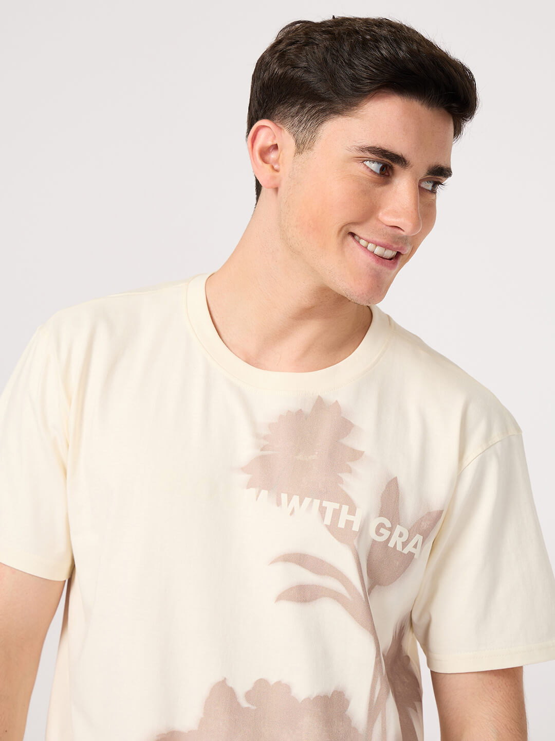 man in beige printed t shirt
