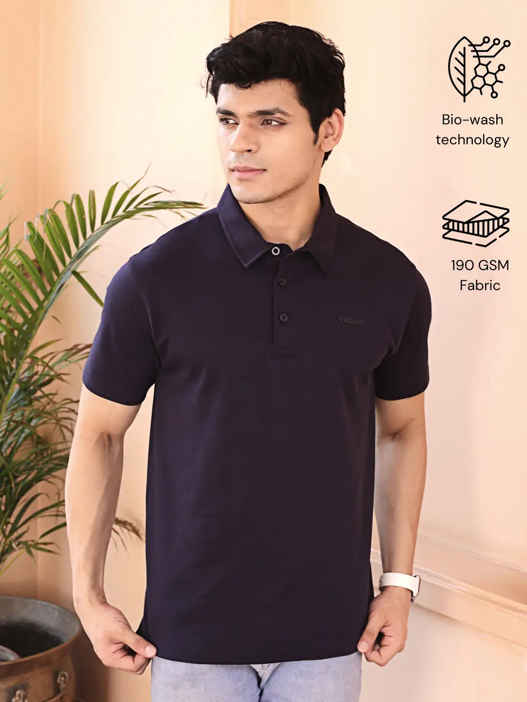 Man wearing a navy blue polo t shirt