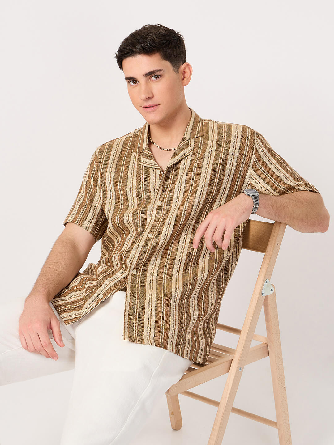 men wearing a brown and beige resort shirt with half sleeve