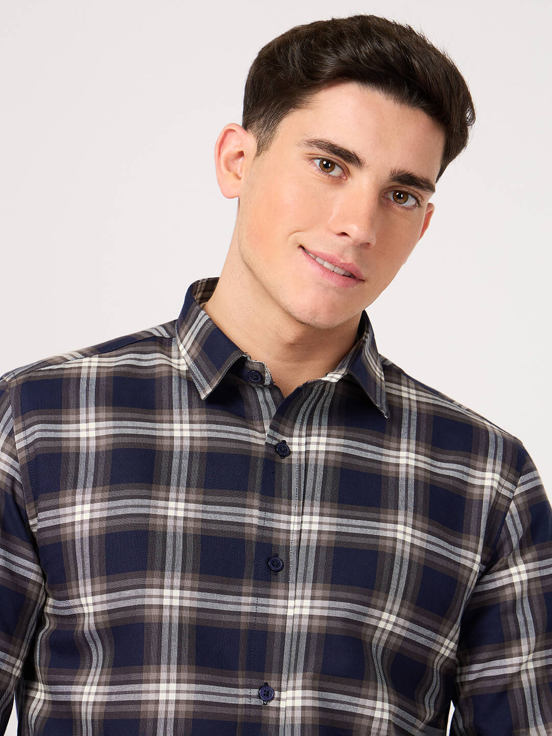 Man wearing a stylish cotton navy check shirt