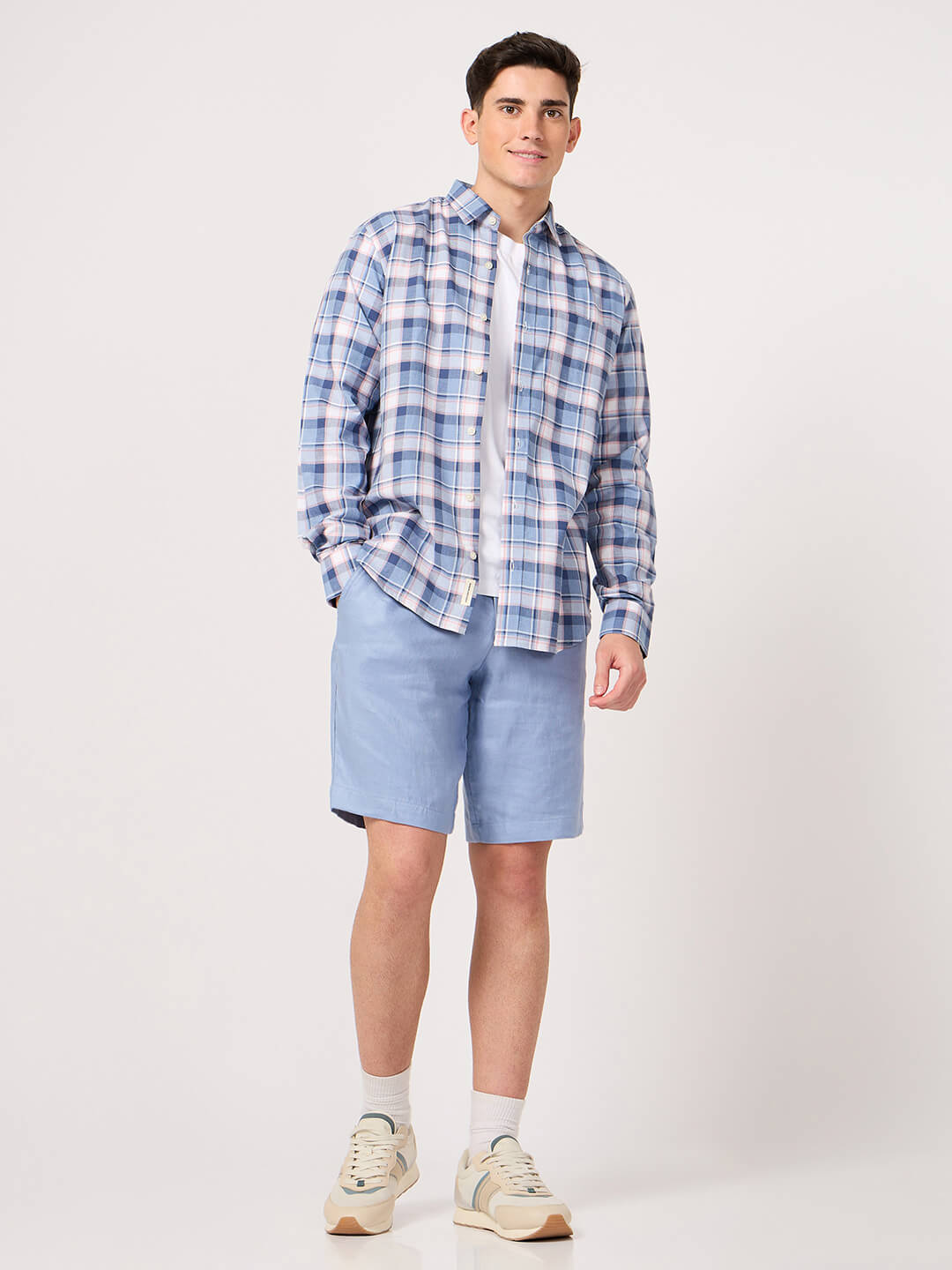 man in sky blue check shirt