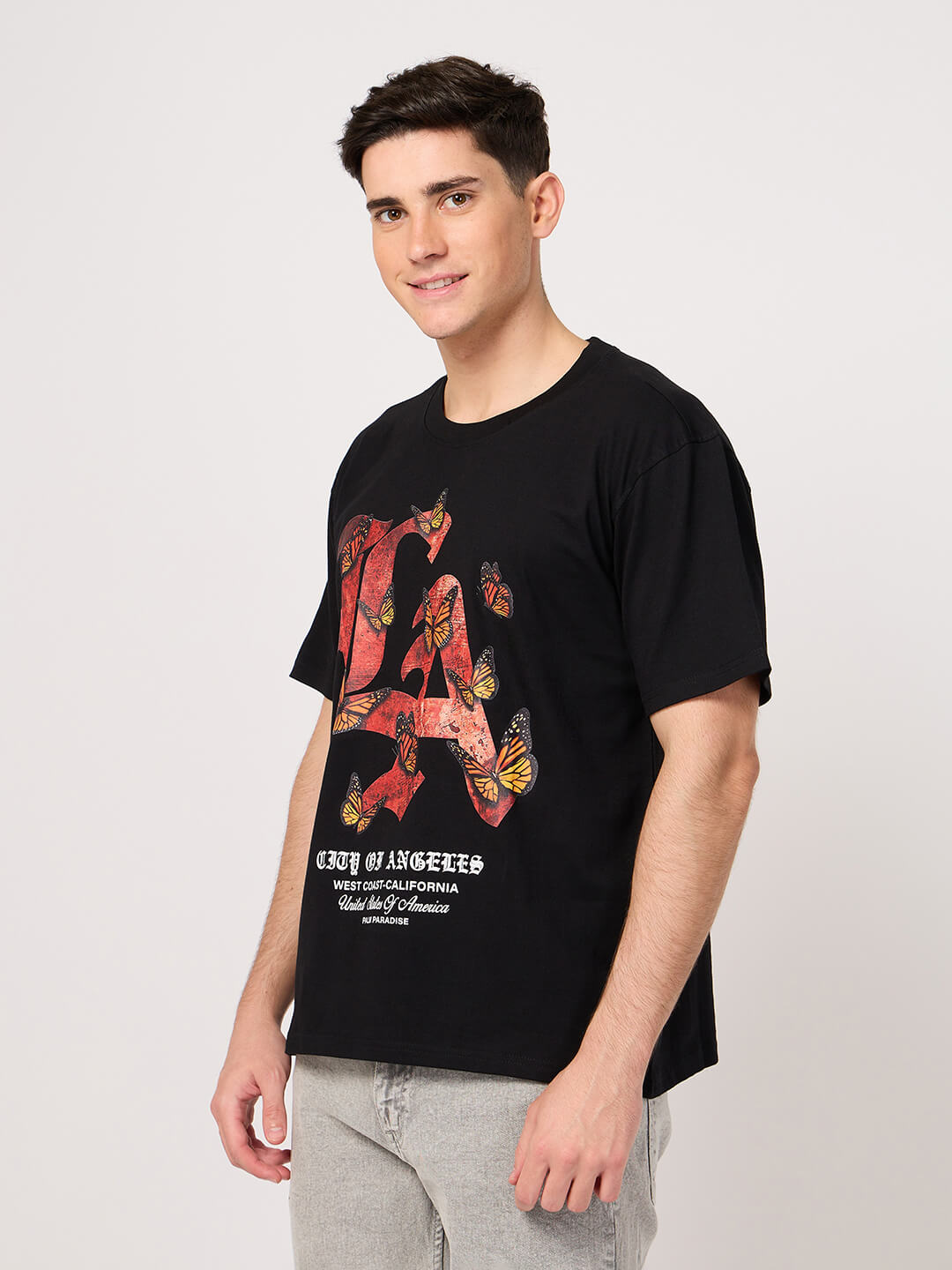 men wearing a thrust club's black LA printed t shirt