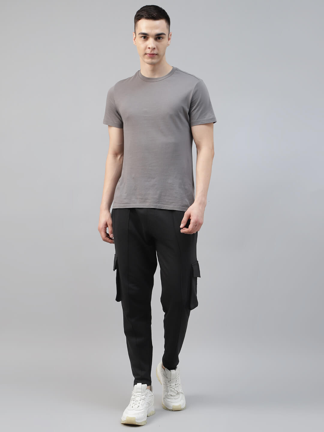 man in grey t shirt with black cotton cargo jogger pant