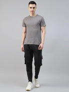 man in grey t shirt with black cotton cargo jogger pant