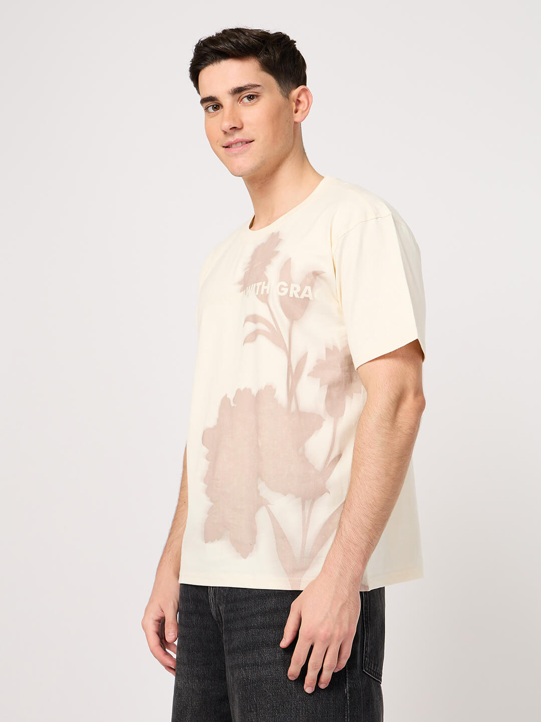 man wearing beige printed t shirt