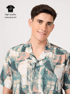 Man wearing a patterned resort shirt with a 'High quality natural print'