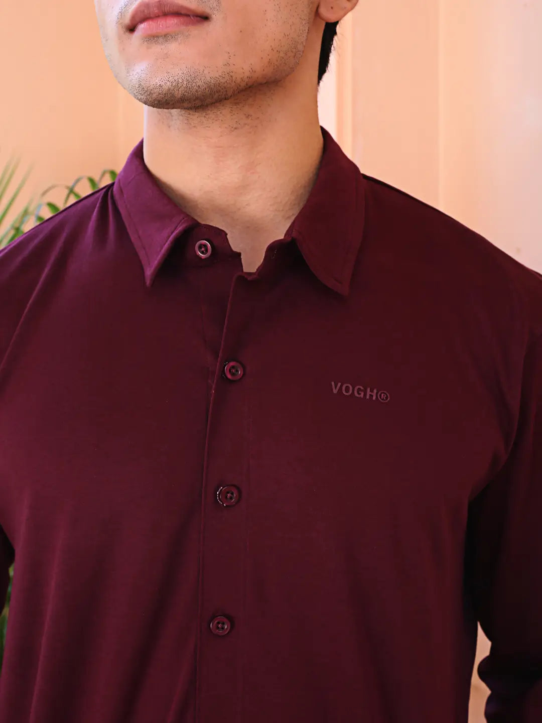 Man wearing a maroon cotton shirt