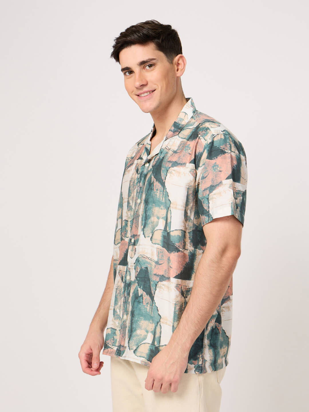 A man wearing a geometric patterned stylish Rayon Resort Shirt with half sleeves