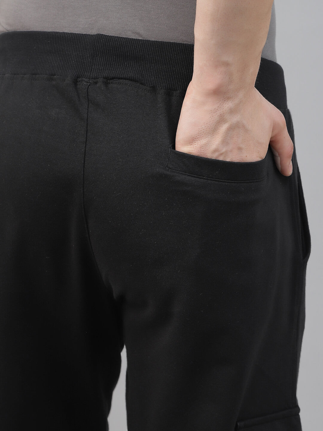black cargo trousers showing back pocket