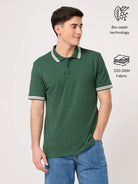Man wearing a green cotton polo shirt