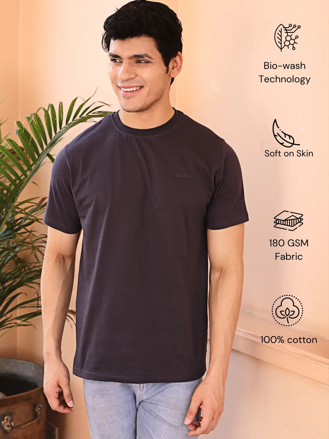 Man wearing a dark grey crew neck cotton t-shirt