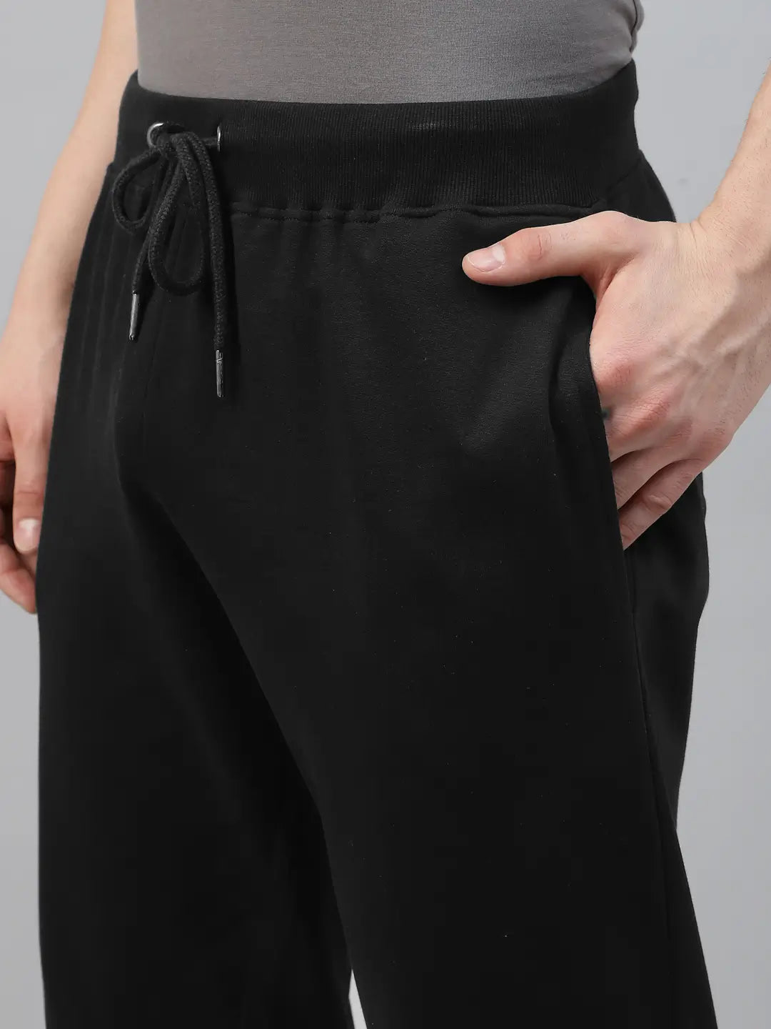 Black pants with drawstring waist worn by a person