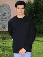 Man wearing a black sweatshirt