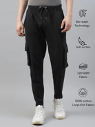 Men's cotton cargo pocket pants in black color, featuring multiple pockets and a drawstring waist.