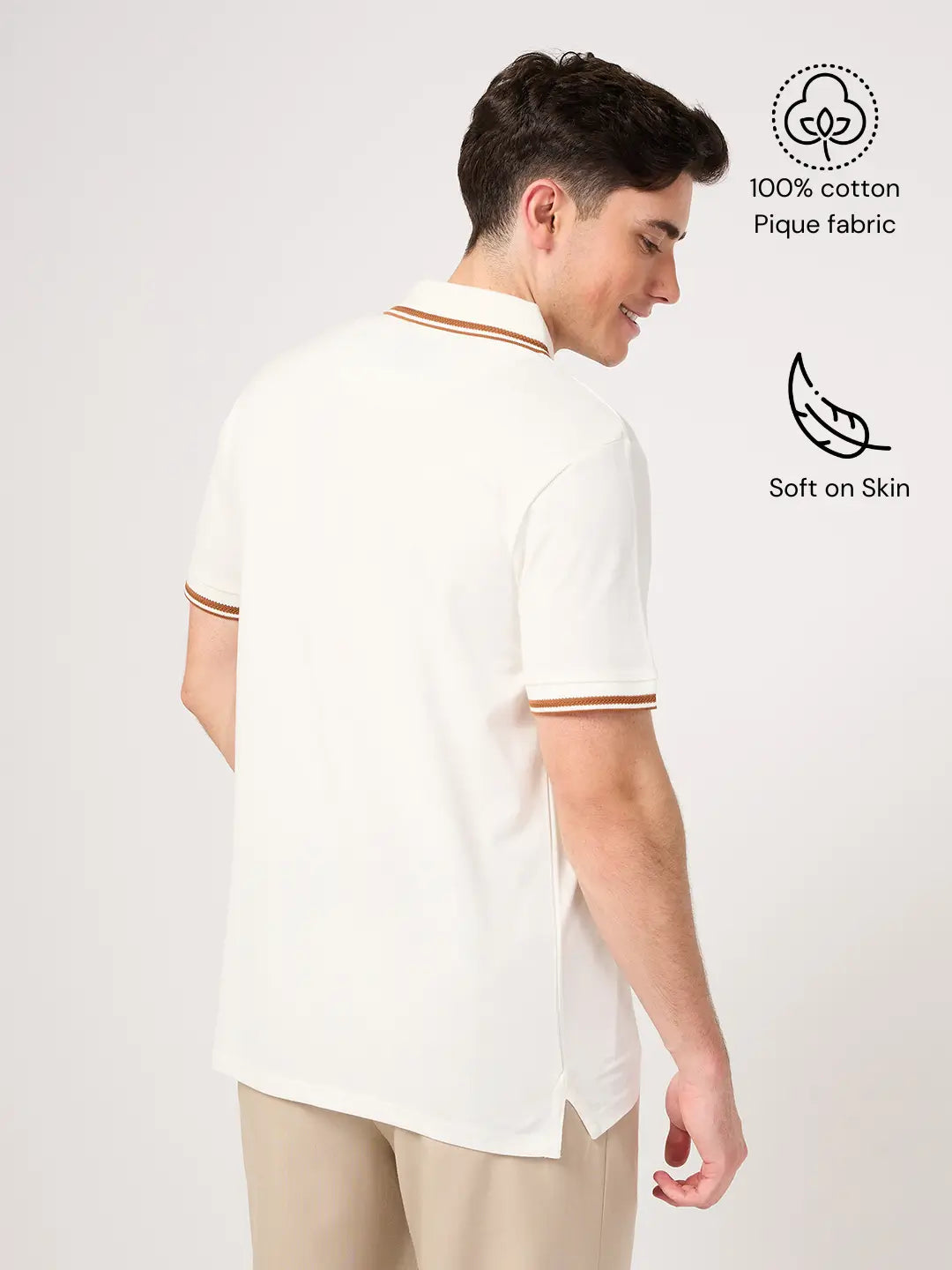 Man wearing a white cotton polo shirt