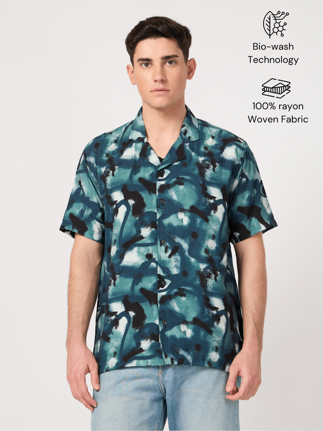 A man wearing a half-sleeve blue rayon resort shirt