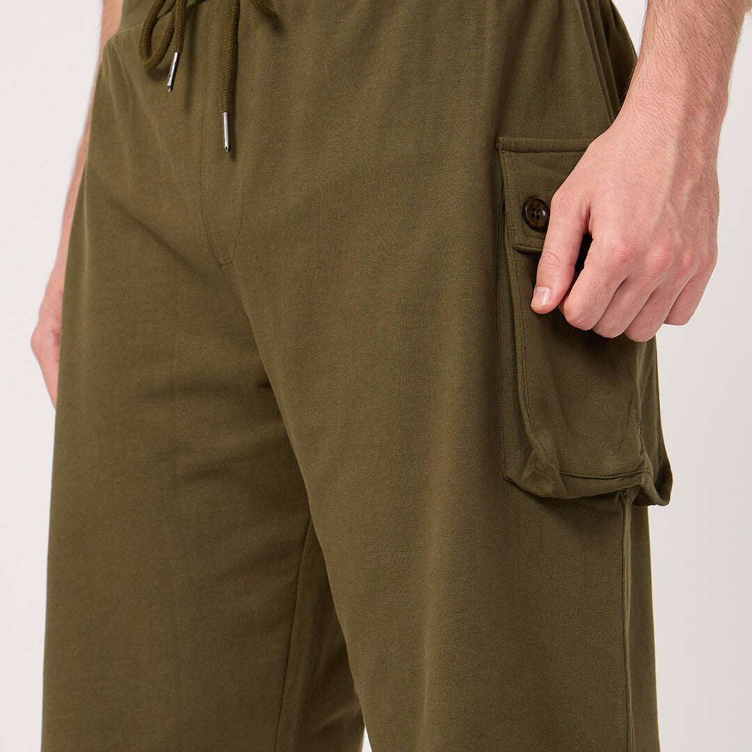 Olive green cargo shorts with a pocket on a white background