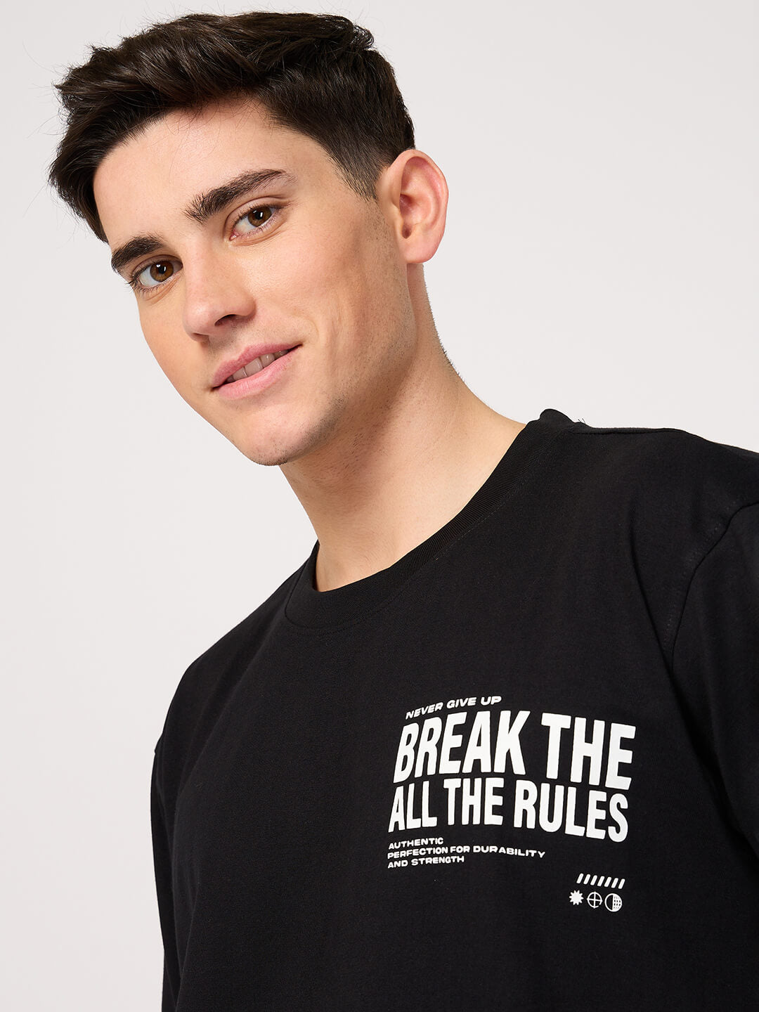 Man wearing a text printed black t-shirt
