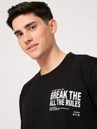 Man wearing a text printed black t-shirt