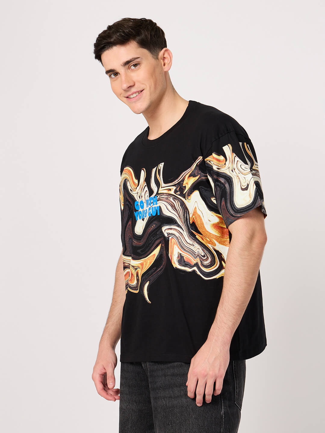 men wearing a black printed t shirt made with bio-washed cotton