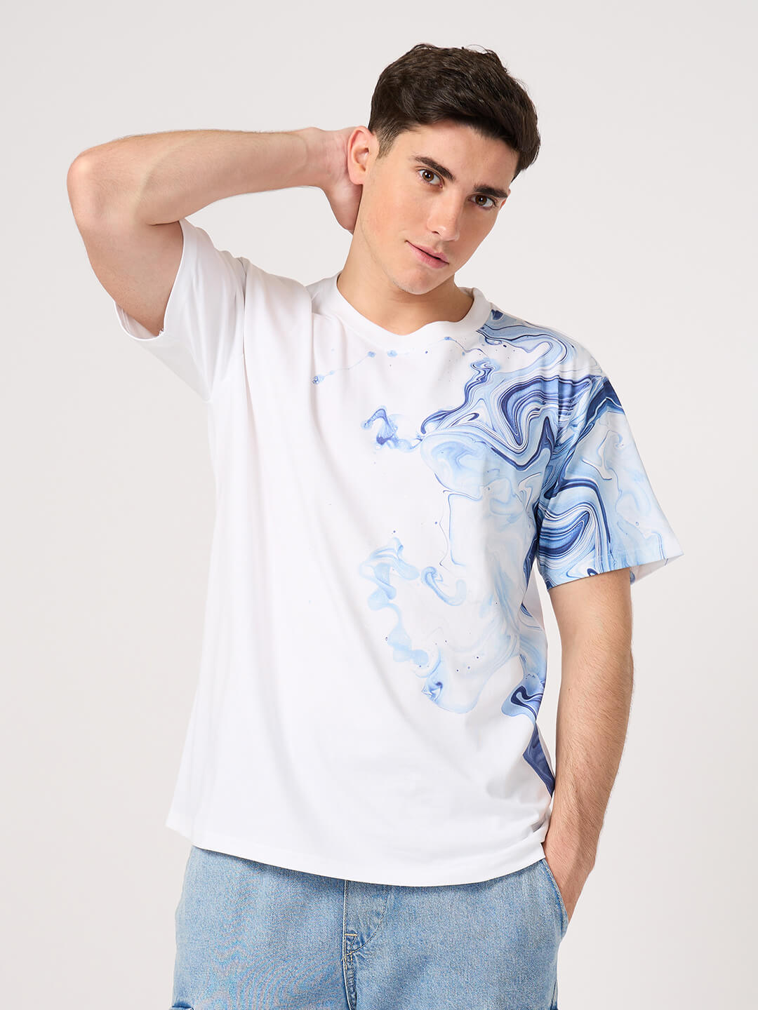 man wearing thrust club's white printed t shirt
