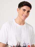 man wearing a white printed t shirt by thrust club
