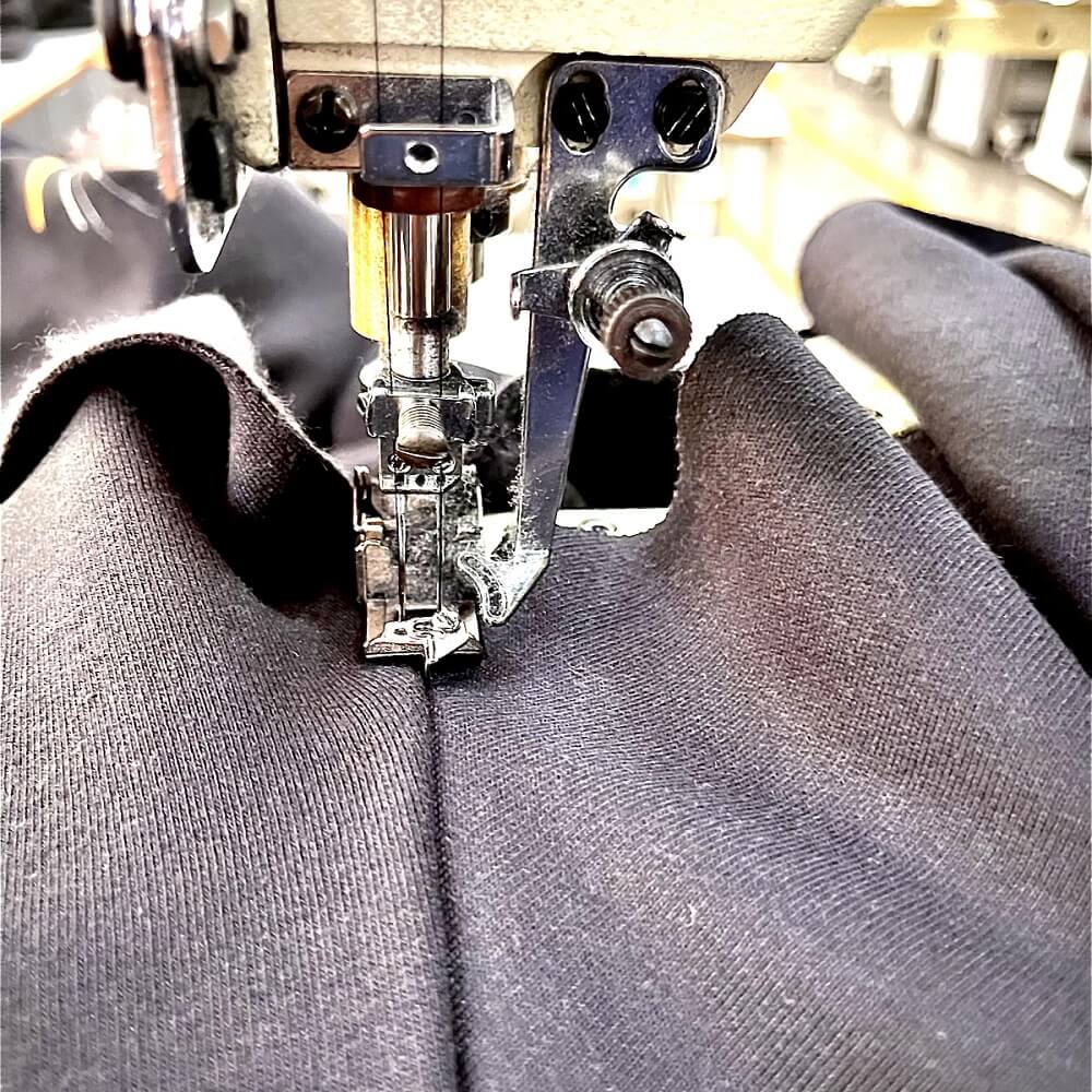 stitching cloth by sewing machine