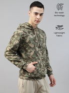 Person wearing a camouflage army hoodie with bio-wash technology