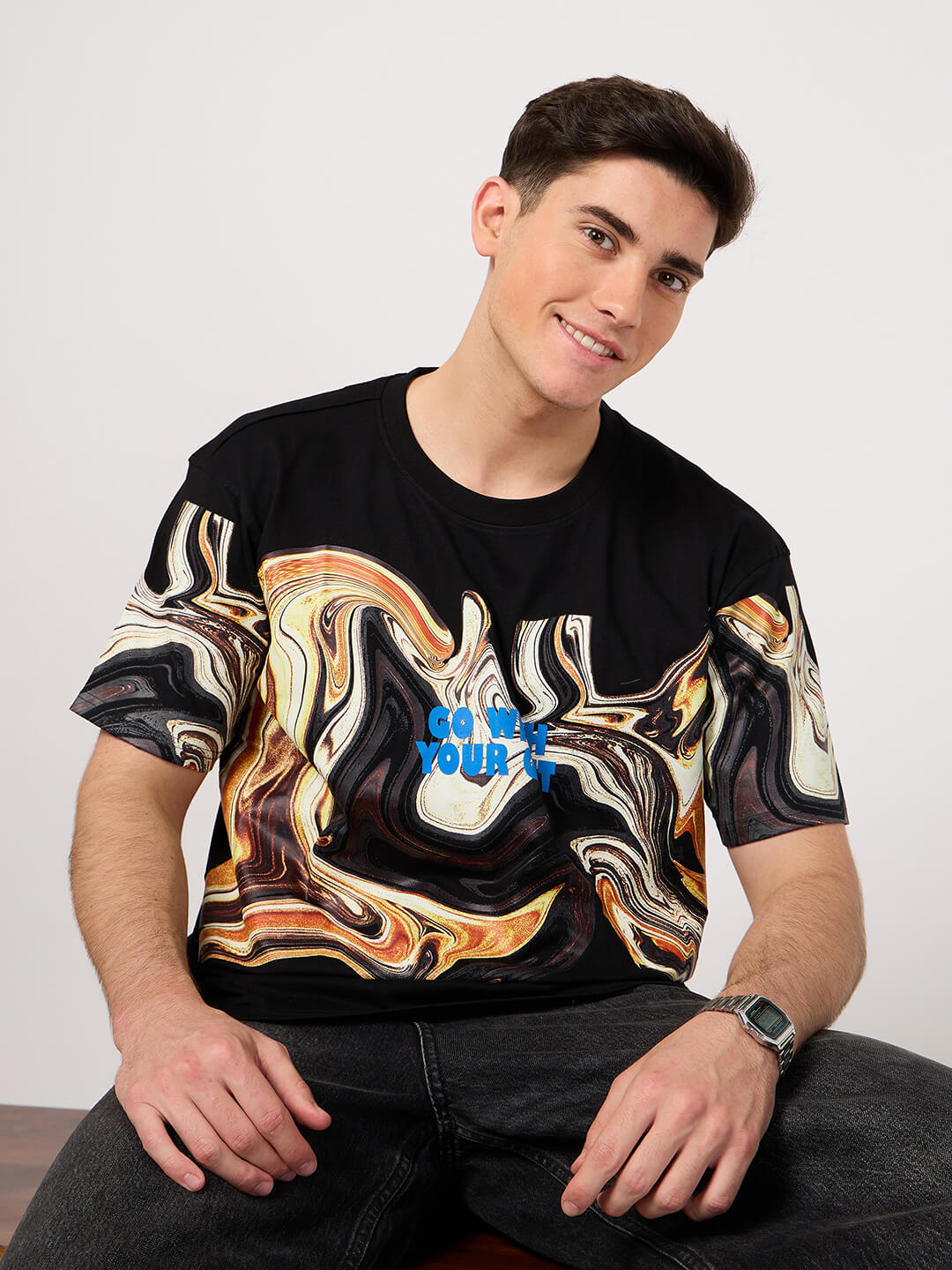 man wearing a printed cerw neck t shirt