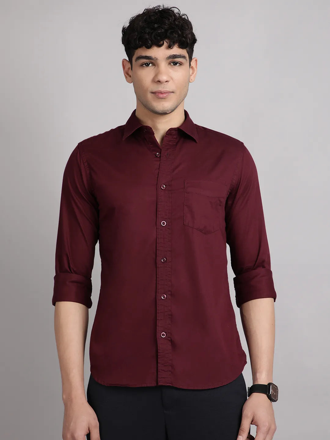 Man wearing a maroon satin shirt