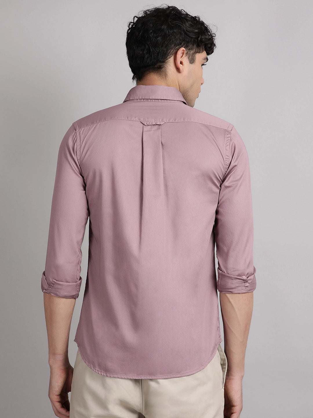 Man wearing solid satin shirt