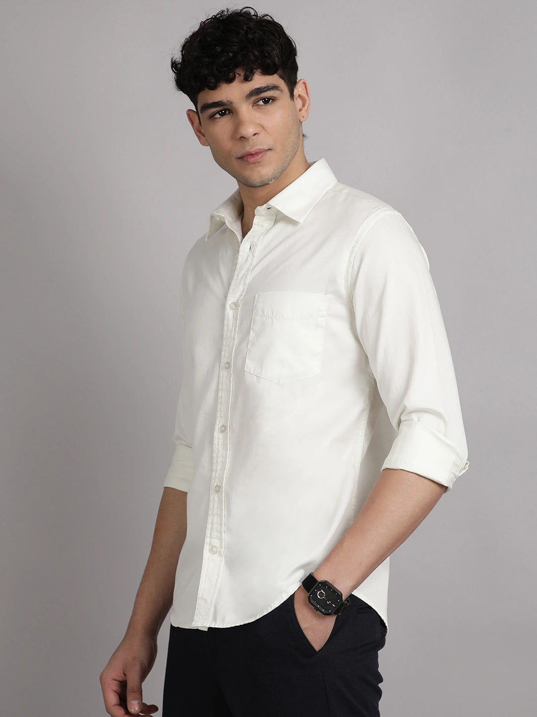 Man wearing a white satin shirt