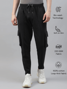 Men's cotton cargo pocket pants in black color, featuring multiple pockets and a drawstring waist.